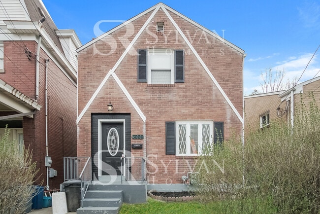Primary Photo - Charming brick 3-bedroom, 1-bath home features a deck and patio!