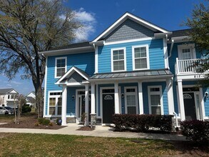 Building Photo - Available Now! - Pet Friendly 2 Bedroom, 2.5 Bath Townhome at Market Common! Cable and Internet I...