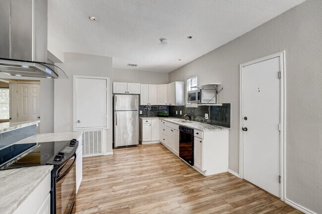 Building Photo - Location, Location, Location! Updated one story home with charm and modern conveniences