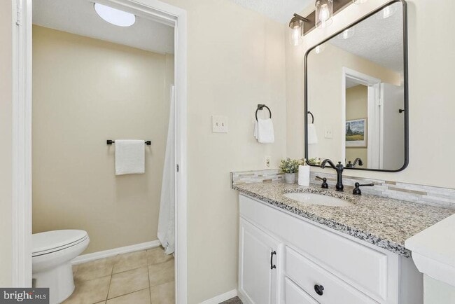 Building Photo - 7619 Nutwood Ct