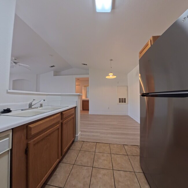 Building Photo - Upgraded 1 Bed 1 Bath Second-Story Condo at Opulence!