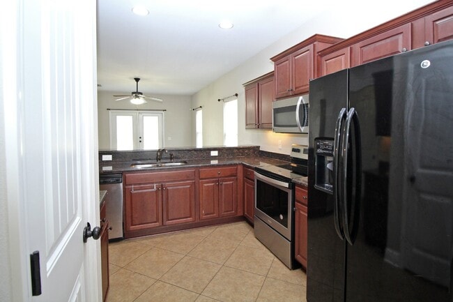 Building Photo - Beautiful 3BR/2BA Brick Home with Granite Kitchen, Covered Patio, Fire Pit & 2-Car Garage Near I-10