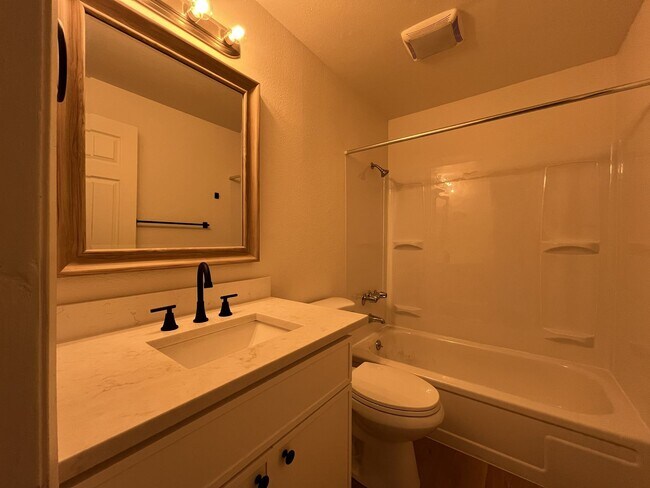 Building Photo - Inviting 2 Bedroom Home with Open Layout, Stainless Steel Appliances & Private Outdoor Retreat