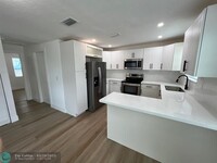 Building Photo - 10540 NW 28th Ave
