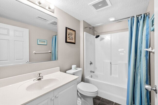 Building Photo - Spacious 3BR/3BA Coastal Retreat at Harbour Pointe – Utilities Included!