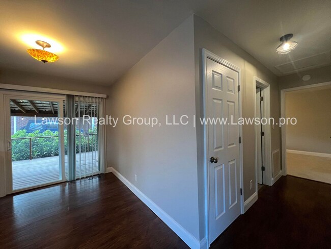 Building Photo - One Level Living- Beautifully Landscaped Yard and Attached Carport