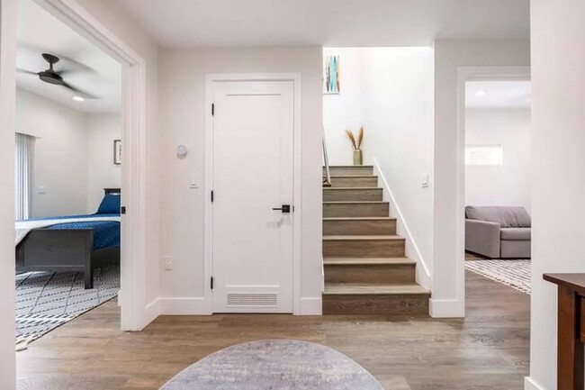 Entry foyer. Ample storage underneath the stairs. - 3355 Lloyd St