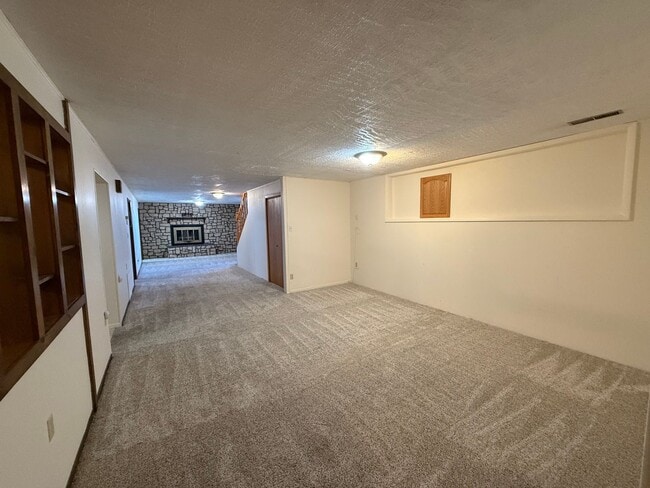 Building Photo - Spacious, four-bedroom, two-bathroom, country home, with two car attached garage, and more!