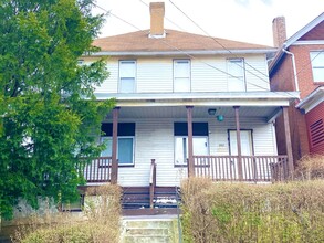 Building Photo - 300 W 13th Ave
