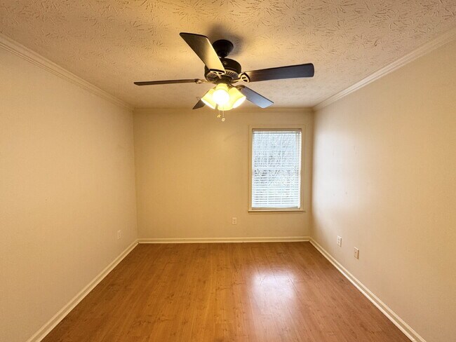 Building Photo - Rare Sugar Hill Rental with Huge Fenced Yard and Outdoor Living Space