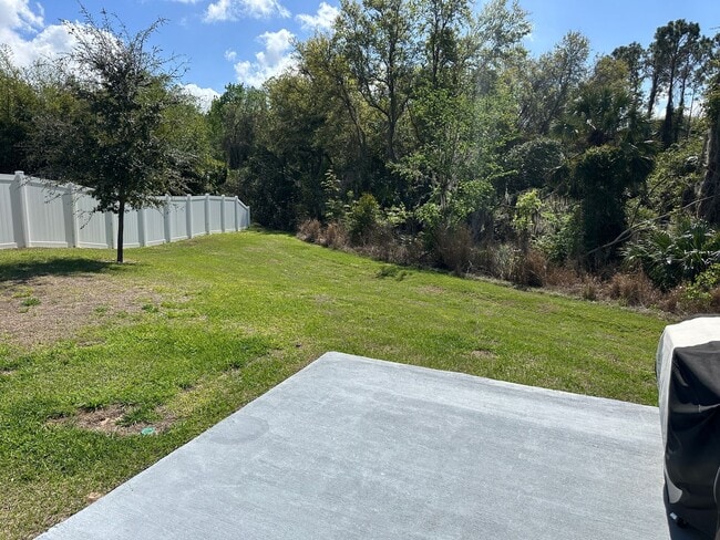 Building Photo - Nearly New 3 Bedroom Smart Home with Lawn Care Included!