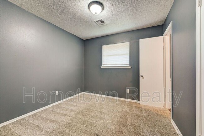Building Photo - 8616 N Harvey Ave