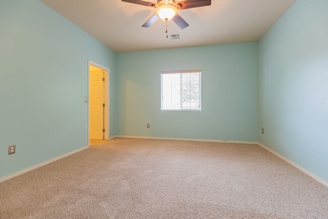 Building Photo - Inviting 4 Bed 2 Bath Home - Solar Panels & In The Golf Course Area!