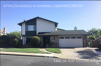 Building Photo - Available Now! Spacious 4-Bedroom, 3-Bathr...