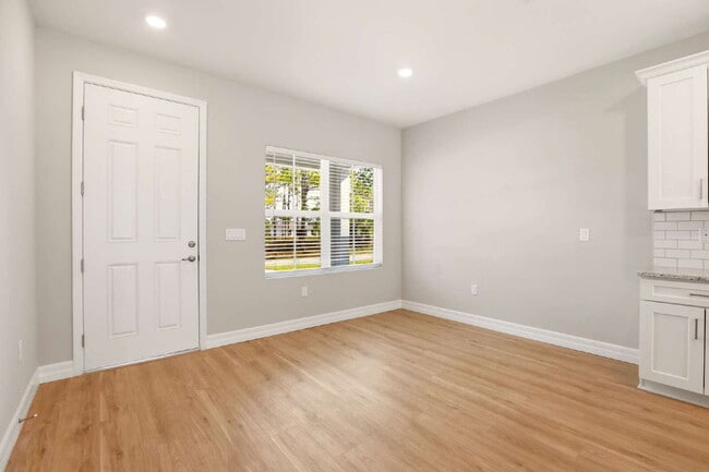 Building Photo - Brand New 4-Bedroom Gem with 2 Full Baths on Large Lot in Lehigh Acres – A Perfect Family Haven!