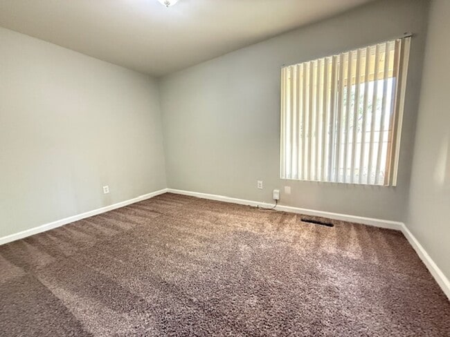 Building Photo - College View Estates Gem – Spacious 3BR Home with Private Yard & RV Parking