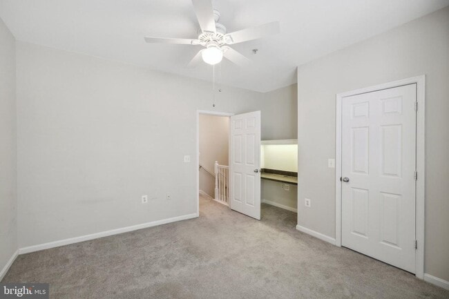 Building Photo - This townhouse style condo is located across the street from the Vienna Metro Station (Orange Line).