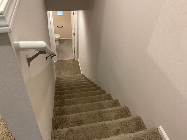 Building Photo - Riverfront Townhome with Tandem Garage & Fenced Yard