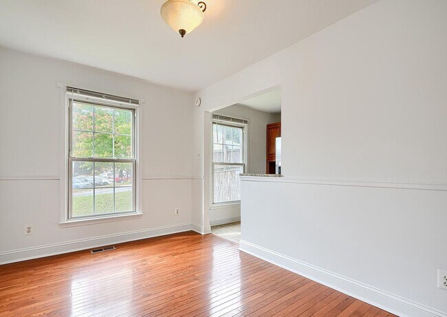 Building Photo - Updated End-of-Group Townhome with Finished Lower Level, Fenced Yard & Community Pool