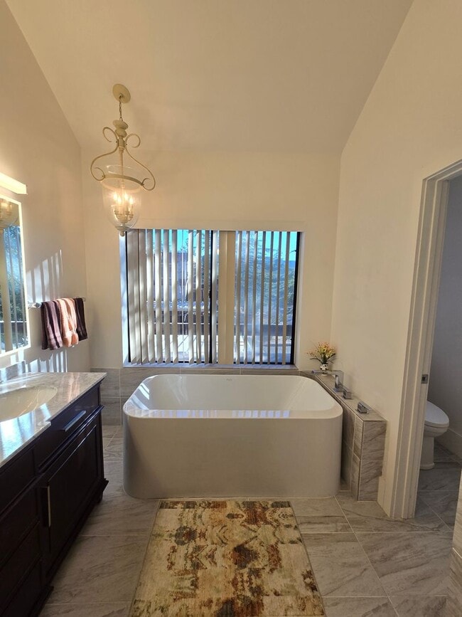 Building Photo - Furnished, 1-Year Long-Term Rental