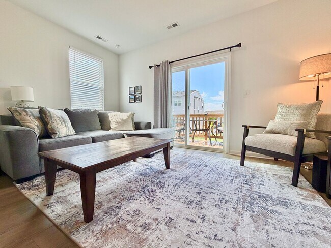Building Photo - Fully Furnished 2BR/3.5BA Townhome with Garage — Minutes from Downtown Raleigh