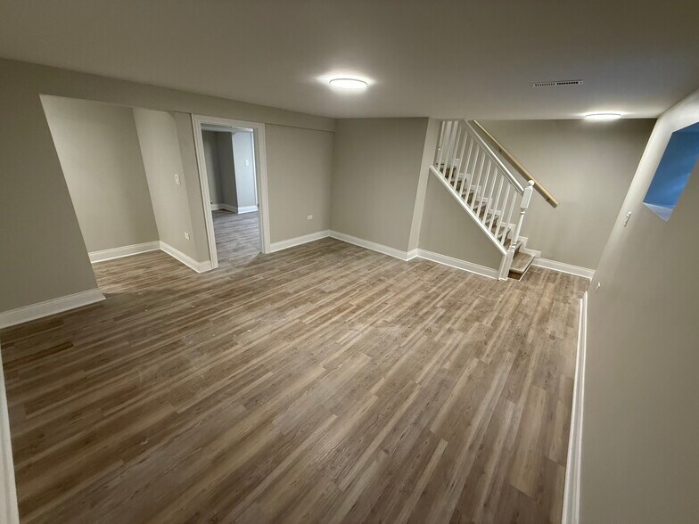 Living room in basement - 512 Yates Ave