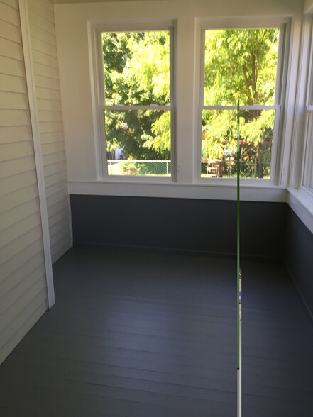 sunporch/opposite direction - 597 S Main St