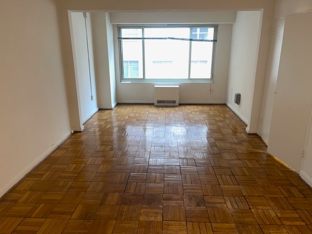 LR w/ wall of windows - 1727 Massachusetts Ave NW