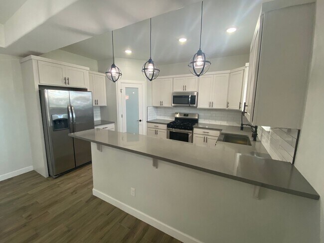 Building Photo - East El Paso 4 bed 2 bath Refrig A/C with gorgeous landscaping!