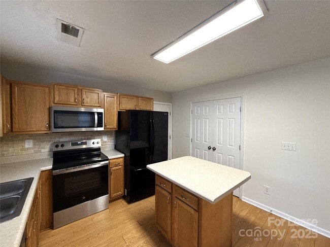 Building Photo - 9806 Baxter Caldwell Dr