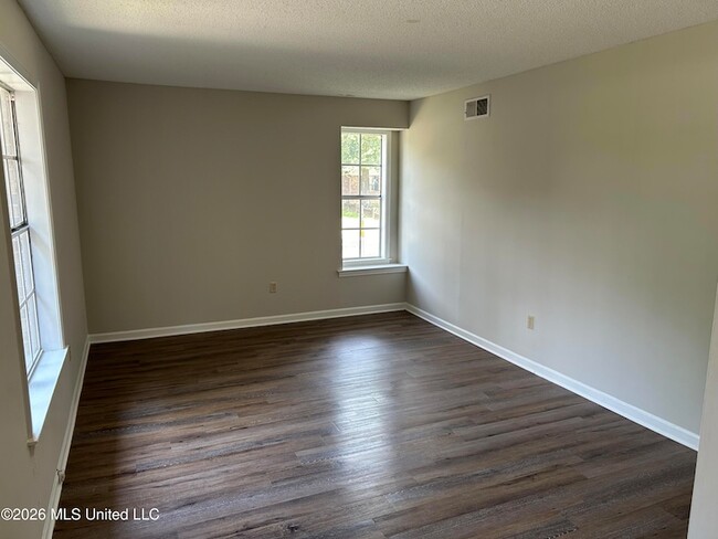 Building Photo - 7397 Meadowbrook Dr