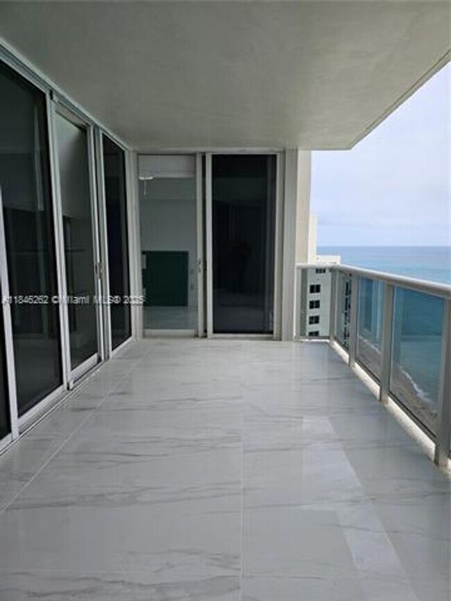 Building Photo - 19111 Collins Ave