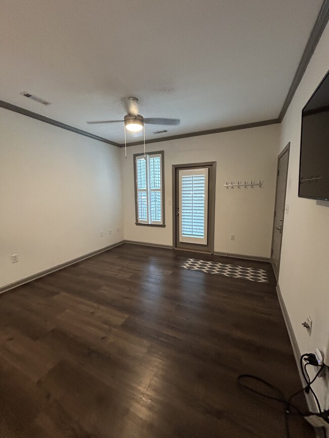 Living room with door to porch - 400 Bucksley Ln