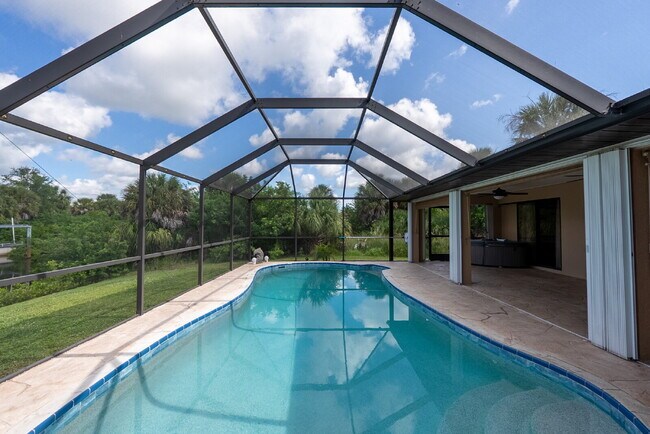 Building Photo - 3 BEDROOM • 2 BATHROOM • PRIVATE POOL • WATERFRONT • BOAT LIFT • ZERO DEPOSIT MOVE-IN AVAILABLE