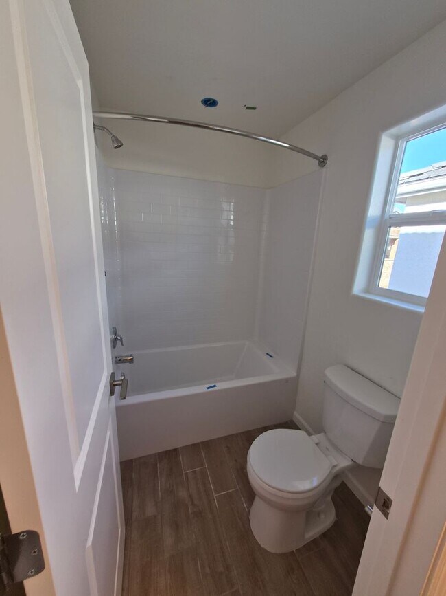 Building Photo - Modern 3-Bedroom Home in the Exclusive Ele...