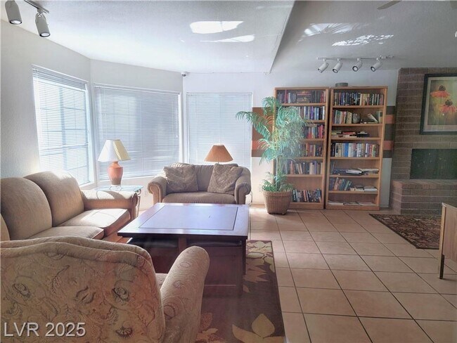 Building Photo - Inviting Green Valley Condo with Dual Balc...