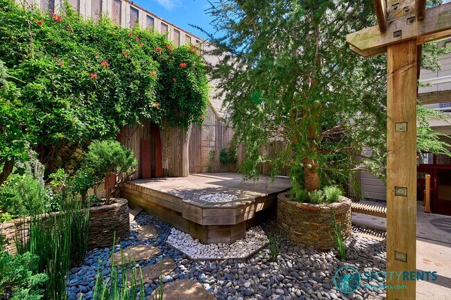 Building Photo - Intimate Super-Lux Home in Zen Garden Sett...