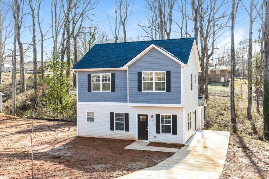 Building Photo - 604 E Texas Ave