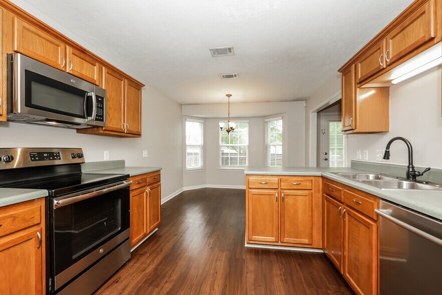 Building Photo - 7551 W Winchester Dr