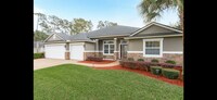 Building Photo - Beautiful 4/3 in Mandarin with in ground s...