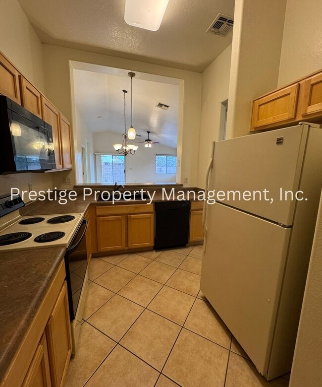 Building Photo - Charming West 2 Bedroom/ 2 Bathroom with a Den is  Waiting For You To Call Home!!