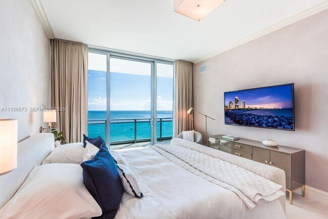 Building Photo - 10295 Collins Ave