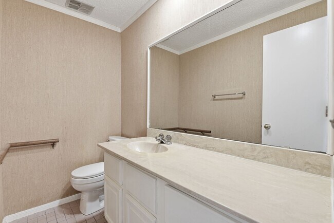 Building Photo - Come see this charming 2-story condo featuring 2 bedrooms and 2.5 bathrooms!