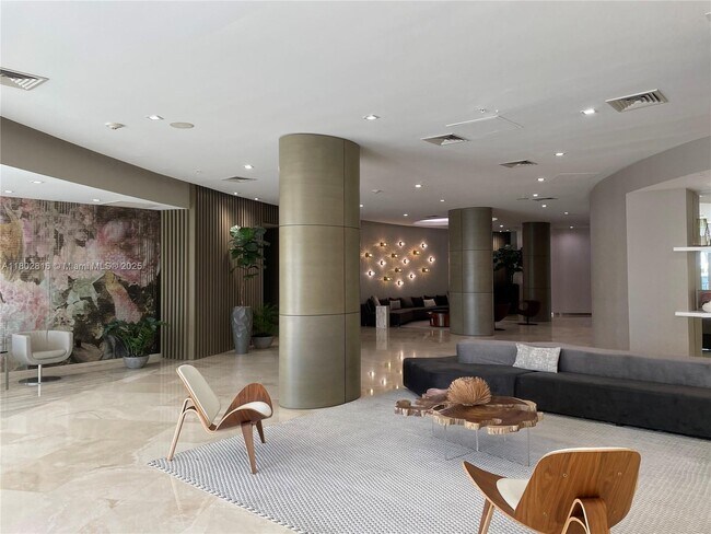 Building Photo - 10275 Collins Ave