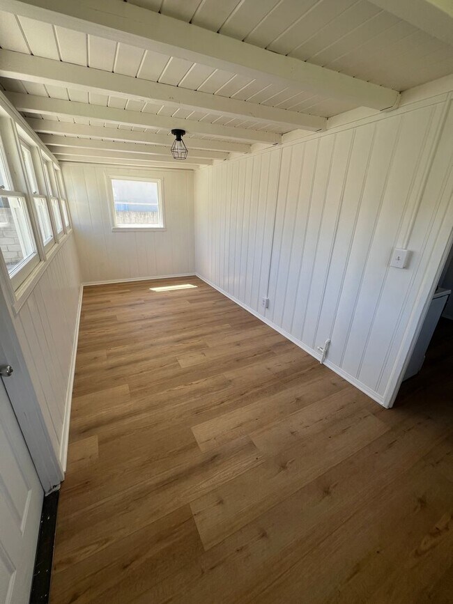 Building Photo - CHARMING! Remodeled 2 Bedroom home with storage and yard