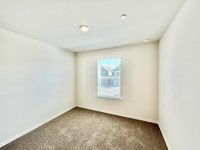 Building Photo - 7012 Cottonseed Dr