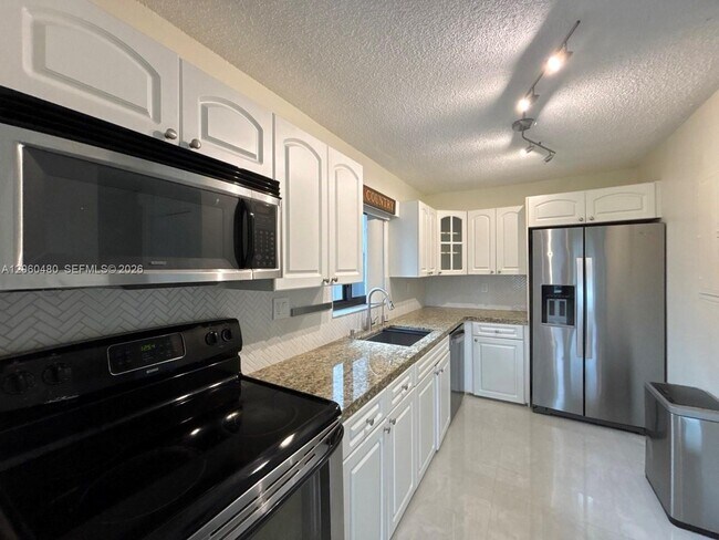 Building Photo - 6900 NW 169th St