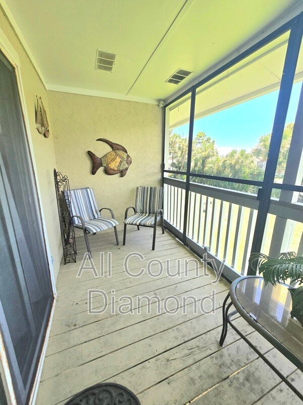 Building Photo - 6903 N Lagoon Dr