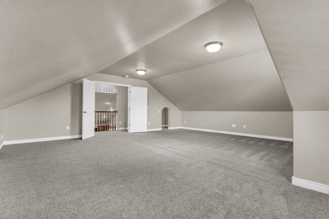 Building Photo - Spacious Syracuse Home with Covered Deck, Loft & Oversized 3-Car Garage