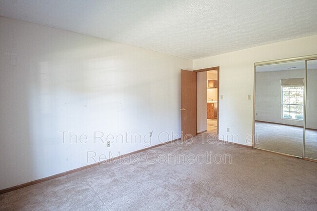 Building Photo - 6486 Reflections Dr